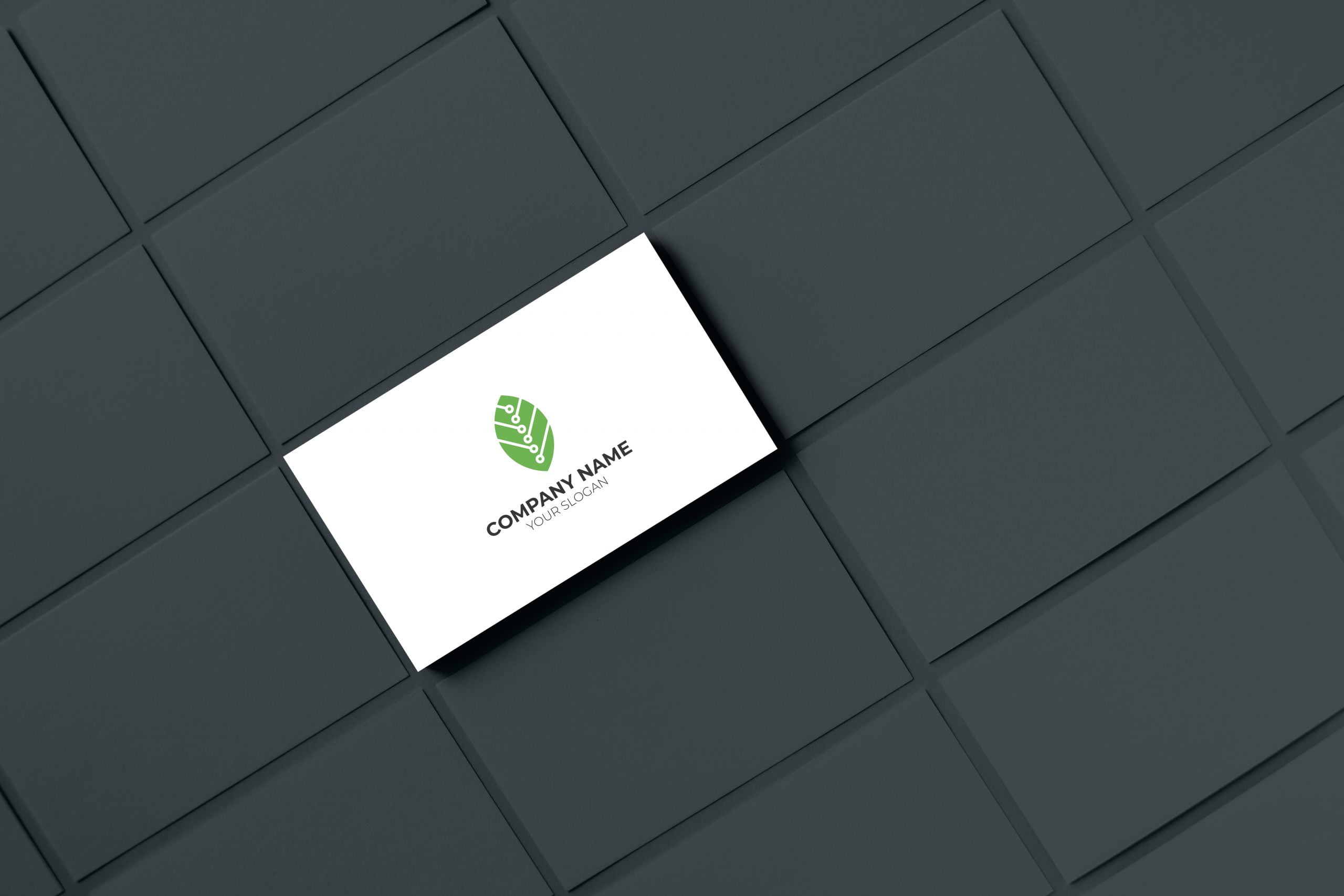 green tech logo on business card presentation