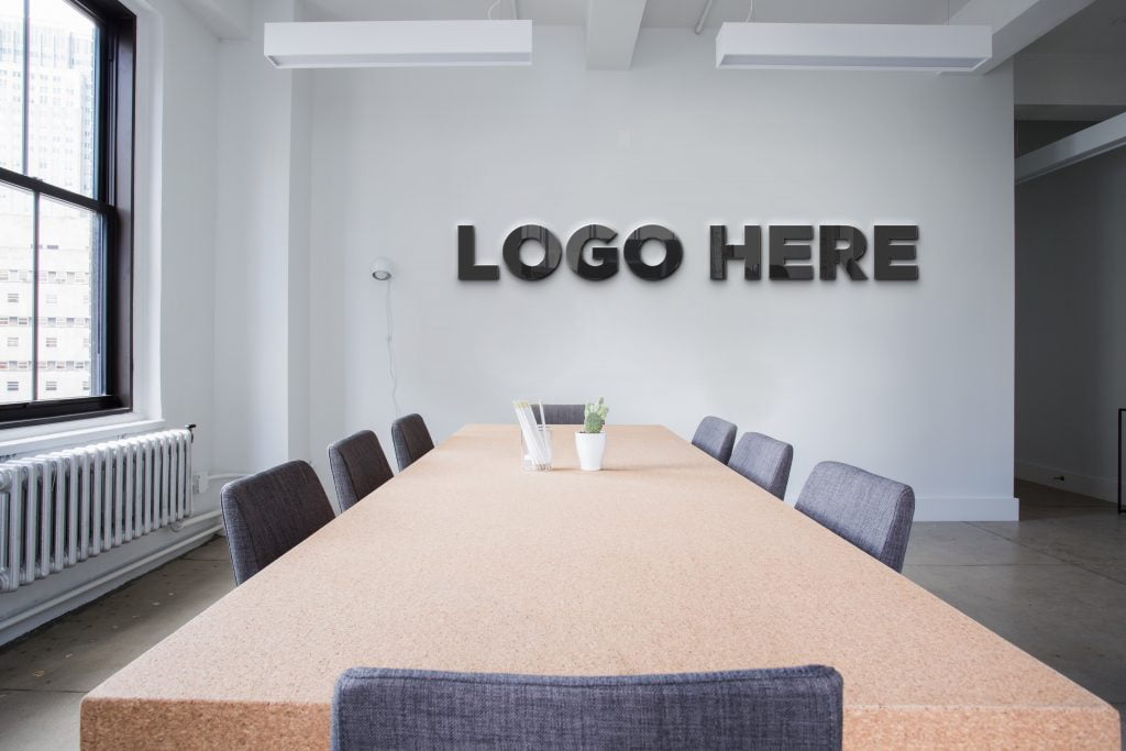 Conference Room Logo Mockup - GraphicsFamily