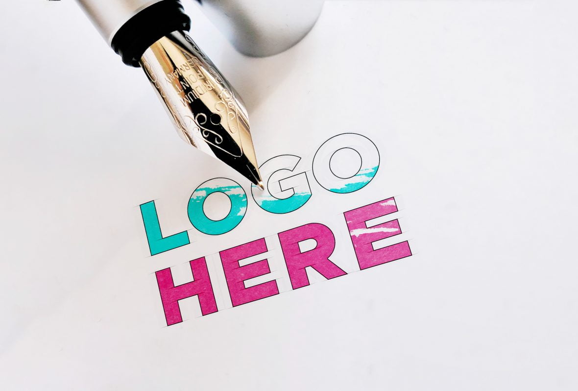 Ink Pen Logo Mockup by GraphicsFamily.com