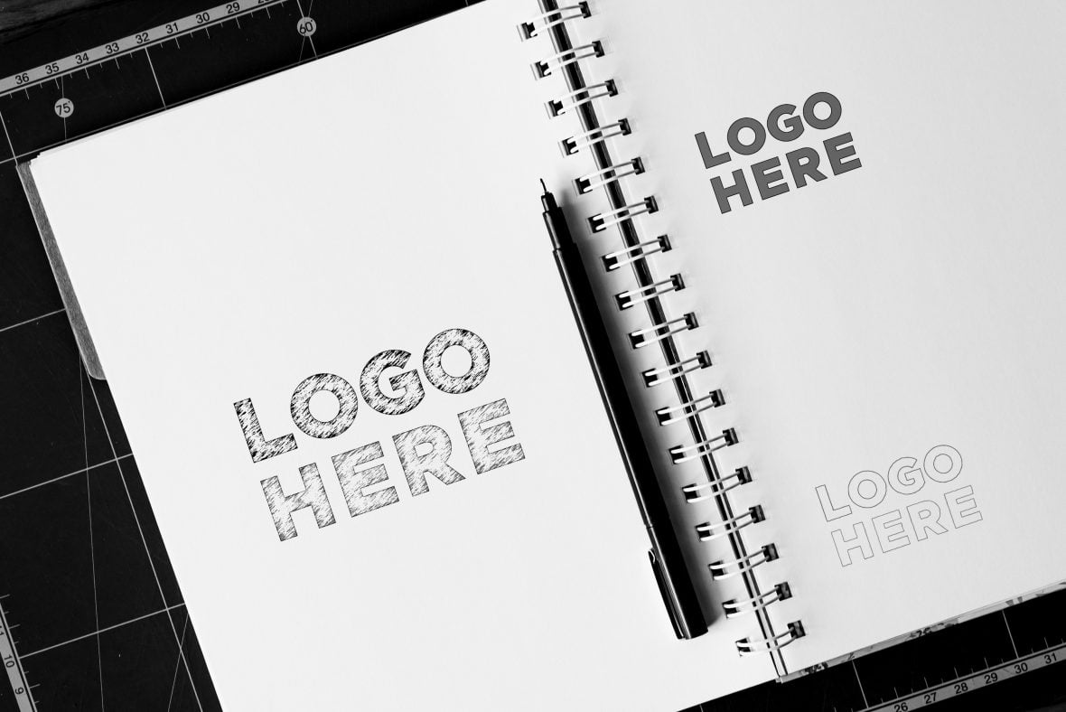 Notebook Sketch Logo Mockup by GraphicsFamily