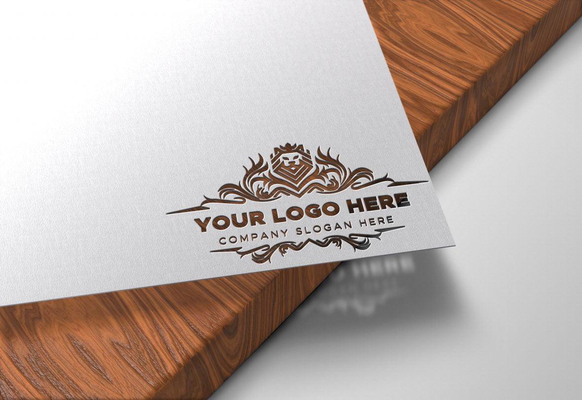 Logo-Here-Paper-Cutout-on-Wood-Logo-Mockup-by-GraphicsFamily