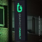 Signage logo mockup on corner facade or storefront with night lighting by GraphicsFamily