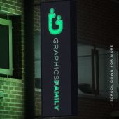 Signage logo mockup on corner facade or storefront with night lighting Free PSD