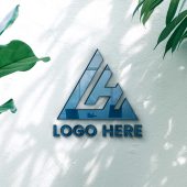 Glass Logo Mockup With White Wall