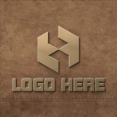 Golden logo mockup on leather background