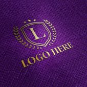 Gold Logo Mockup on Purple Fabric Texture