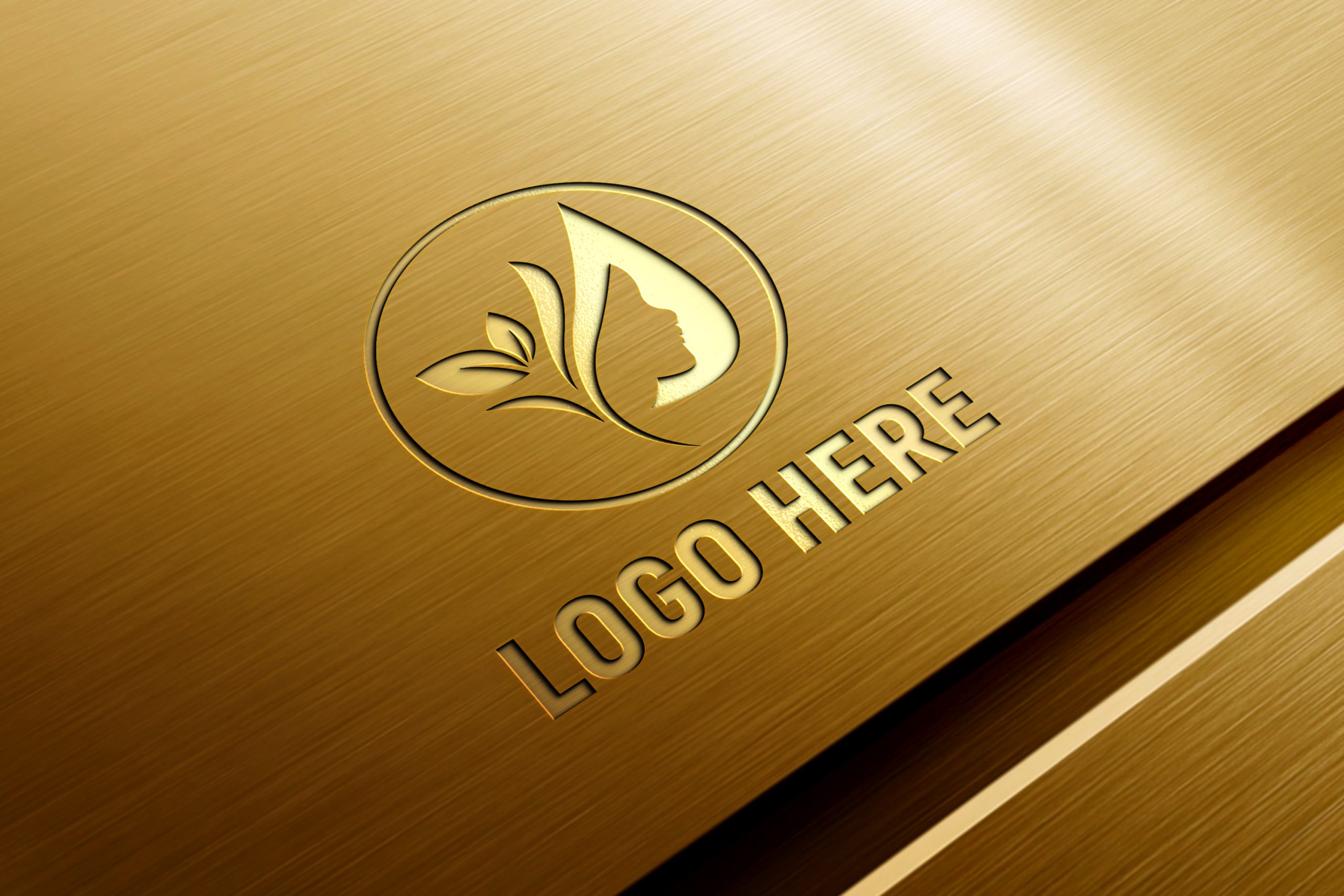 Embossed 3D logo mockup on metal panel gold style – GraphicsFamily