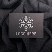 Embossed logo mockup on black paper