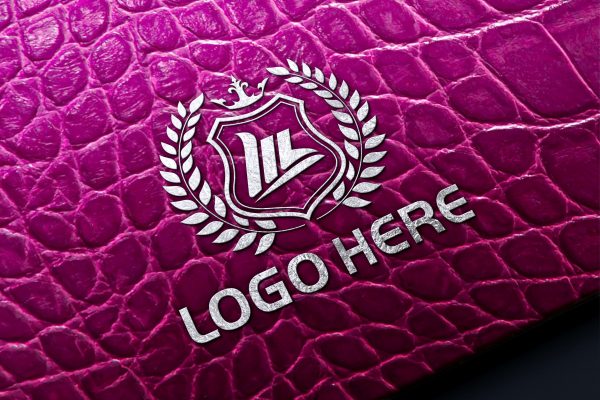 Logo Mockup on Purple Alligator Skin – GraphicsFamily