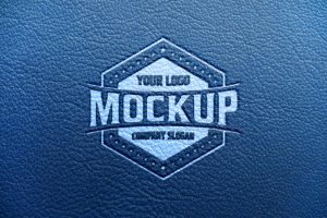 Logo Mockup on Blue Leather Background – GraphicsFamily