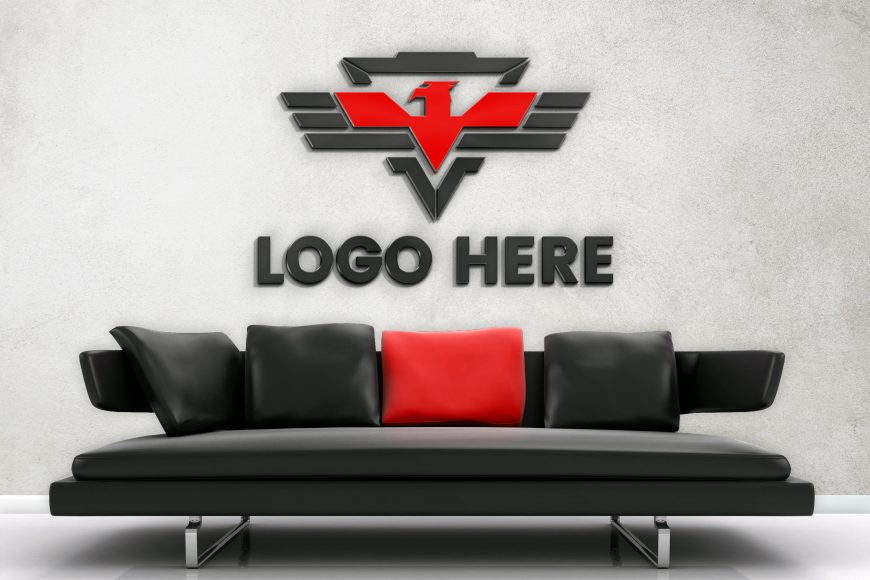 White Wall Logo Mockup with Black Sofa