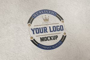 Engraved logo mockup on gray cement wall – GraphicsFamily