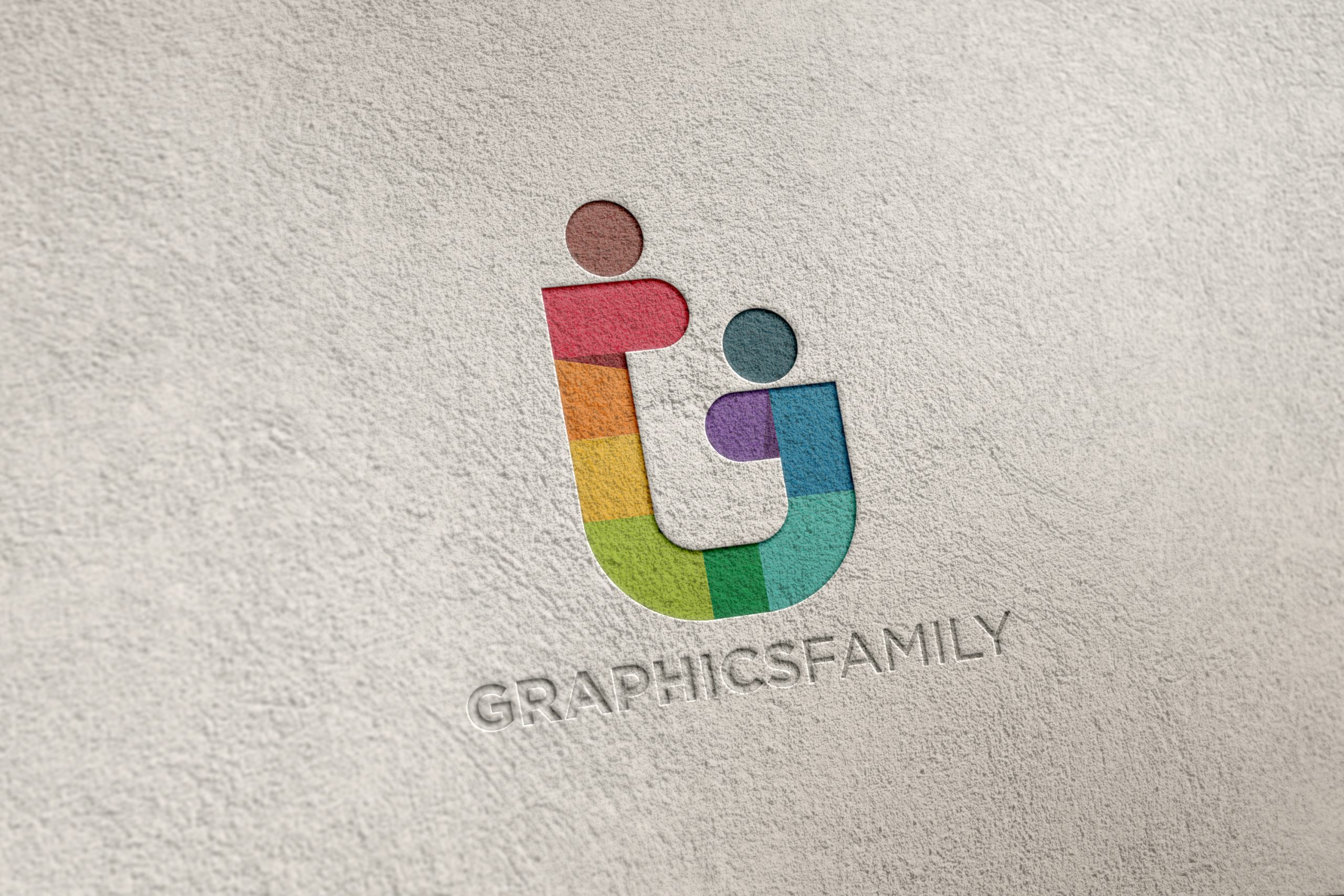 Engraved logo mockup on gray cement wall by GraphicsFamily