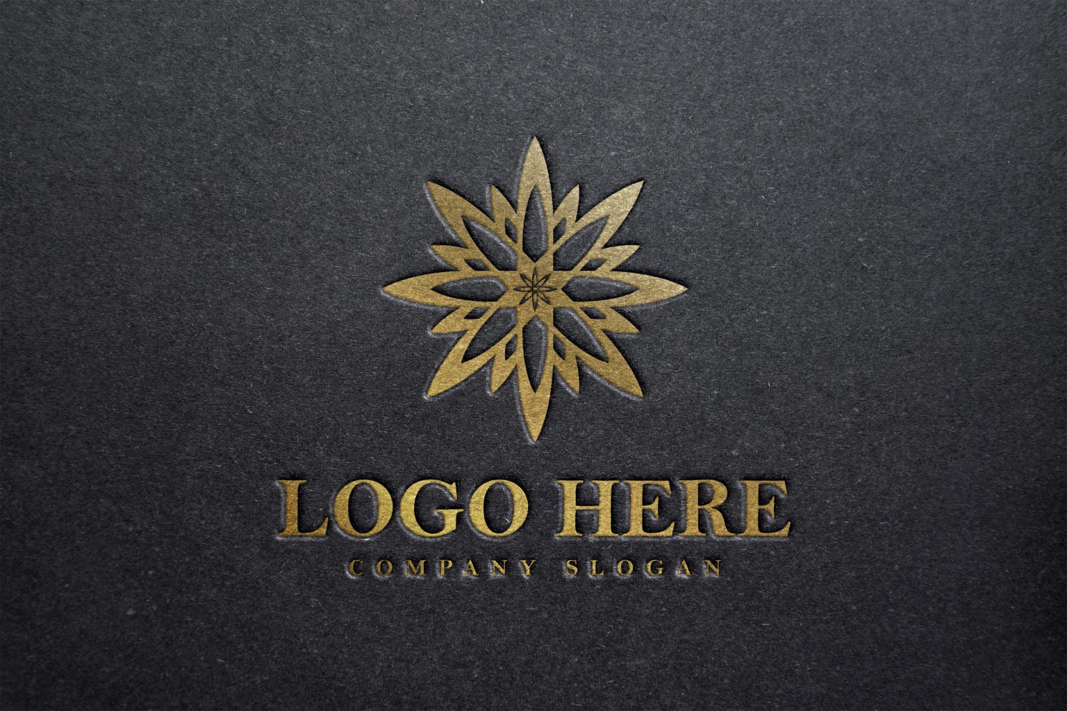 Golden art logo mockup on black paper GraphicsFamily