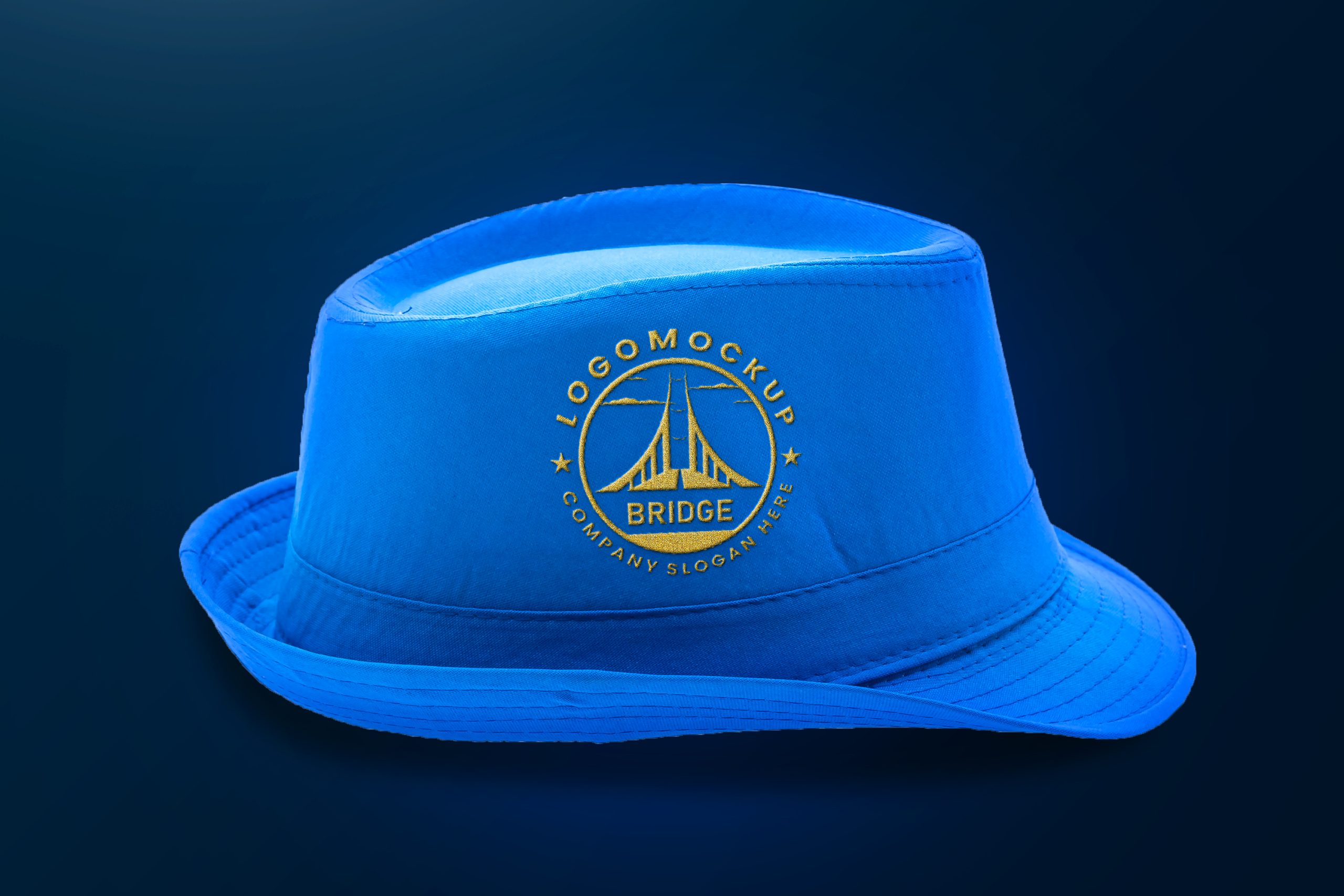 Golden Logo Mockup on Blue Hat by GraphicsFamily