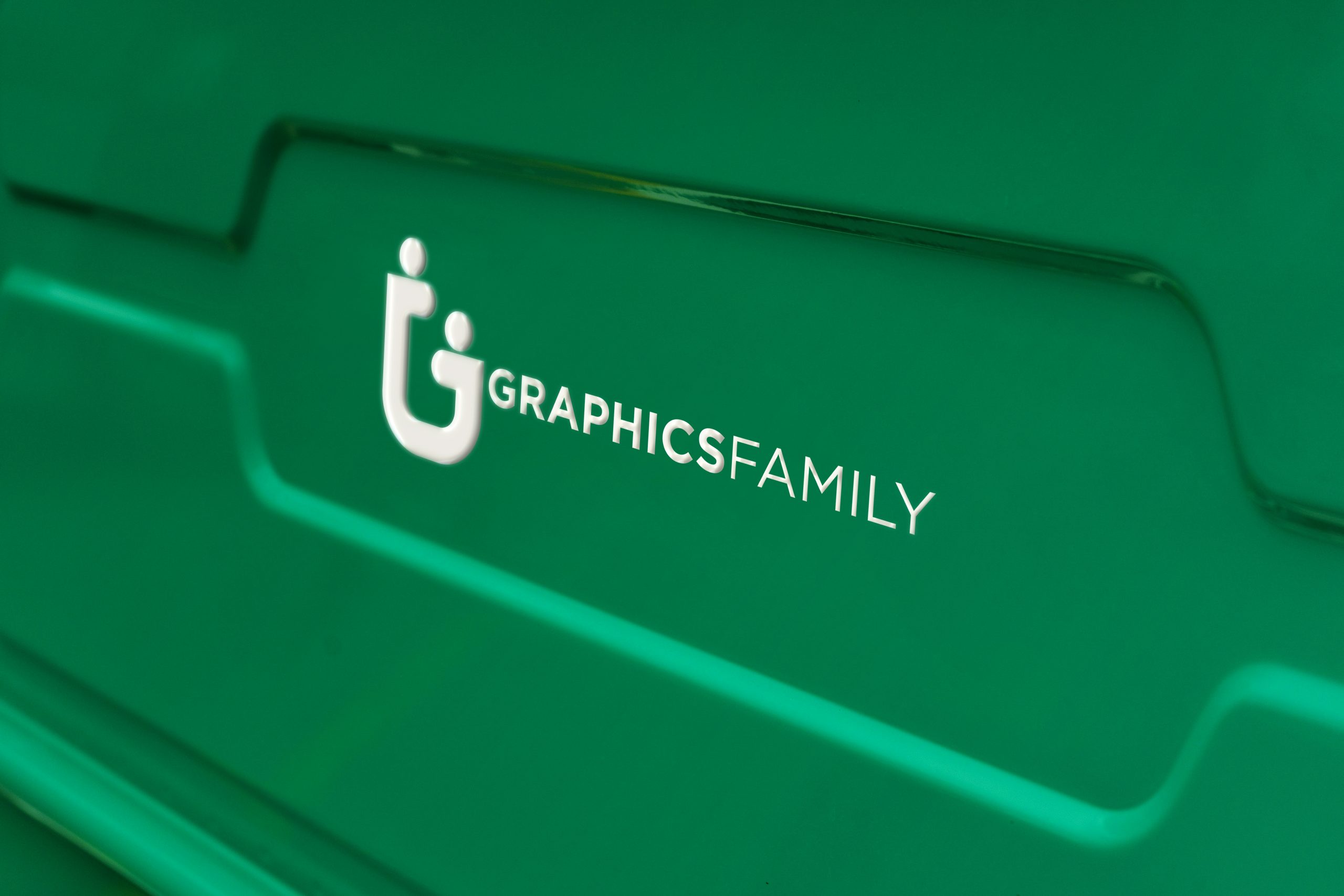 White Logo Mockup on Green Background by GraphicsFamily